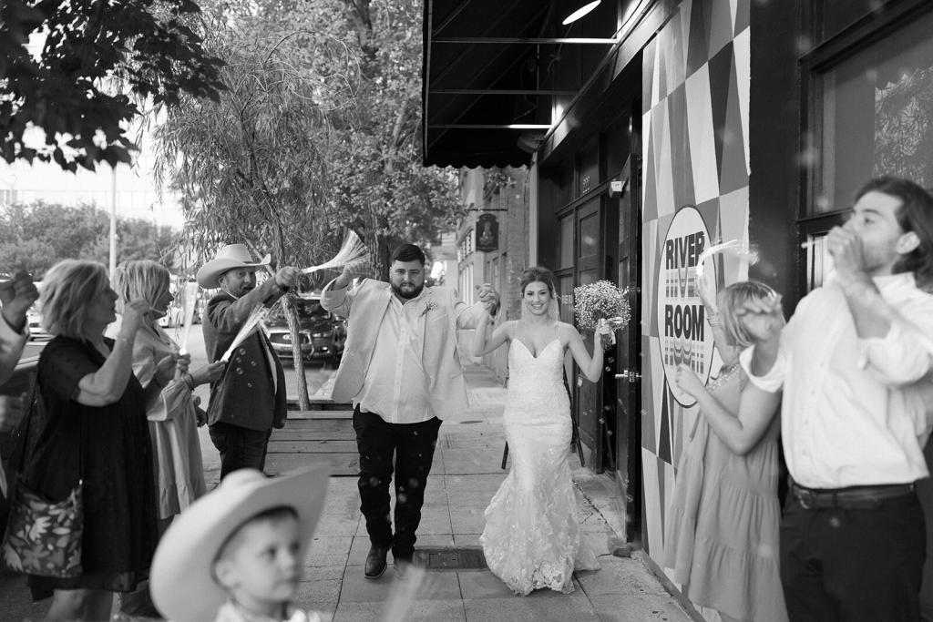 Bride and groom exiting wedding